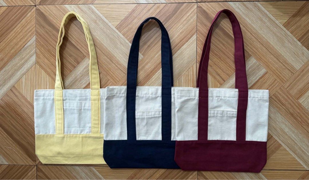 Two-tone Tote Bags (Category: Tote Bags) located in Tarlac. Submitted by tellontanya (Listing ID 1460732364, Image 3). Description: Two-tone Tote Bags 12 x 11 size - ₱170 18 x 15 size - ₱200 Can be bought by piece or bulk. Also open for personalized tote bags & mugs and for any occasions! DM for inquiry/orders!.