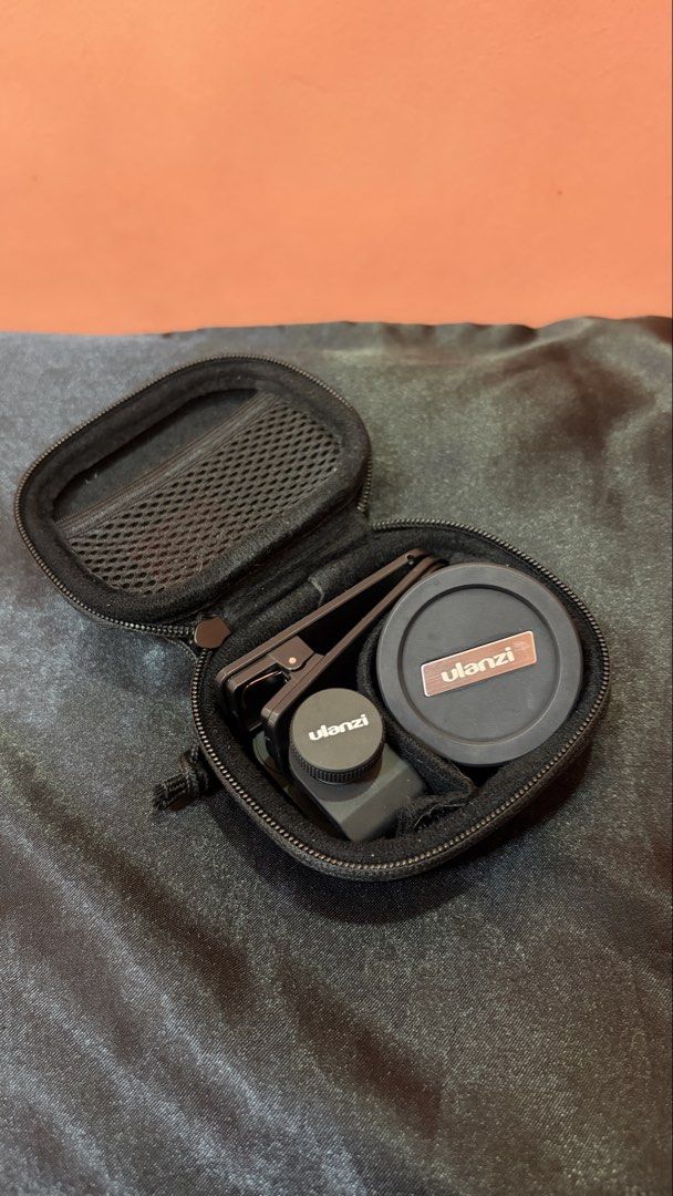 ULANZI 75 mm Macro Camera Lens Complete Kit with Clip and Case (Category: Cameras) located in Pasig City. Submitted by kimberlytorralba (Listing ID 1460897833, Image 1). Description: - MOP: Maya - MOD: Any motor couriers (c/o buyer).