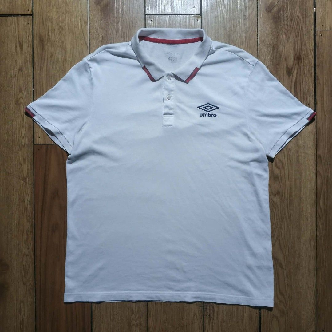 Umbro Polo Shirt (Category: Activewear) located in Manila. Submitted by thriftinefolife (Listing ID 1460851742, Image 1). Description: Good Condition.