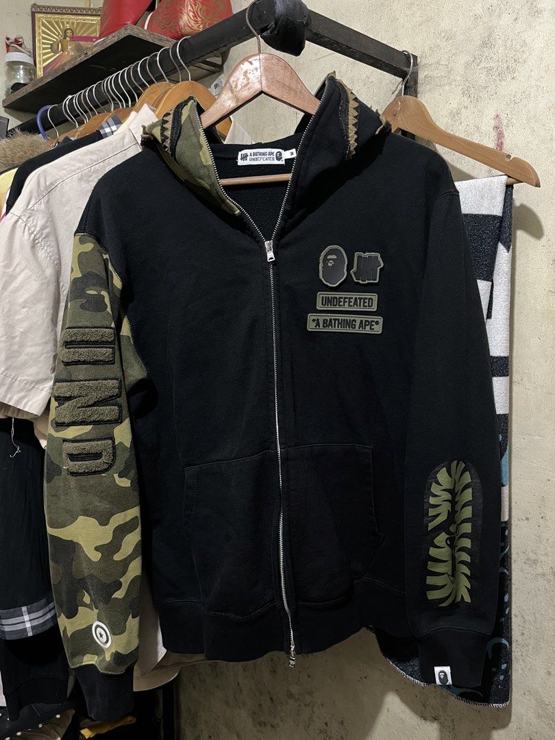 Undefeated x BAPE Shark Hoodie (Category: Coats, Jackets and Outerwear) located in Quezon City. Submitted by lv-selection (Listing ID 1460779493, Image 1). Description: ₱8,000 Slightly Used Size Medium Authentic Open for meet ups or pick up..