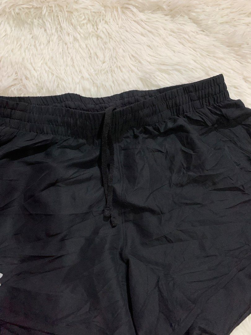 Under Armour Black Running Shorts (Category: Activewear) located in Iba. Submitted by thriftcoyan (Listing ID 1460725599, Image 3). Description: - Black Under Armour running shorts - Elastic waistband with drawstring - Small Under Armour logo on left leg - Mesh detailing on the side - Ideal for workouts or casual wear -Size 30-32 -length 12 -Excellent condition black na black pa.