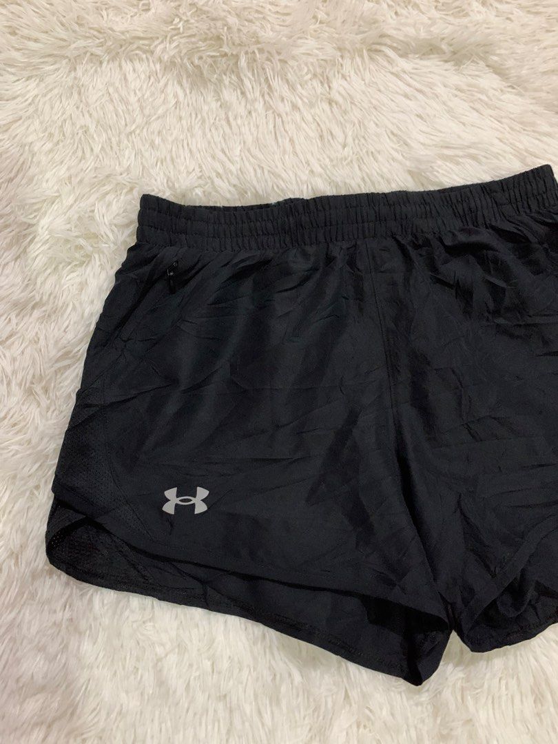 Under Armour Black Running Shorts (Category: Activewear) located in Iba. Submitted by thriftcoyan (Listing ID 1460725599, Image 2). Description: - Black Under Armour running shorts - Elastic waistband with drawstring - Small Under Armour logo on left leg - Mesh detailing on the side - Ideal for workouts or casual wear -Size 30-32 -length 12 -Excellent condition black na black pa.