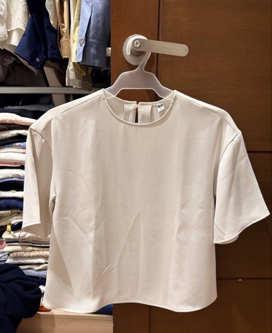 Uniqlo Draped Blouse (Category: Blouses) located in Marikina City. Submitted by nicasandoval (Listing ID 1460917977, Image 1). Description: used twice only.