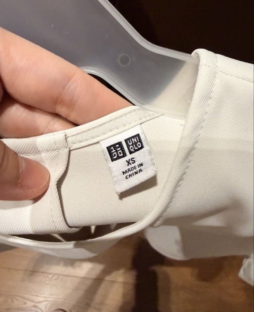 Uniqlo Draped Blouse (Category: Blouses) located in Marikina City. Submitted by nicasandoval (Listing ID 1460917977, Image 2). Description: used twice only.