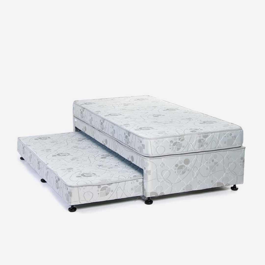 Uratex Elan Single Bed with Pull-out Trundle Bed (Category: Bed Frames & Mattresses) located in Trece Martires City. Submitted by jus.legaspi4221 (Listing ID 1460766101, Image 1). Description: Optimize your home’s space with the Uratex Elan Trundle Bed. Its dual sleeping layers roll out smoothly for extra comfort and neatly store away when not in use. - Jaquard Fabric Cover - High Quality Foam - Wooded frame - Dimensions: 198.12cm (L) x 121.92cm 