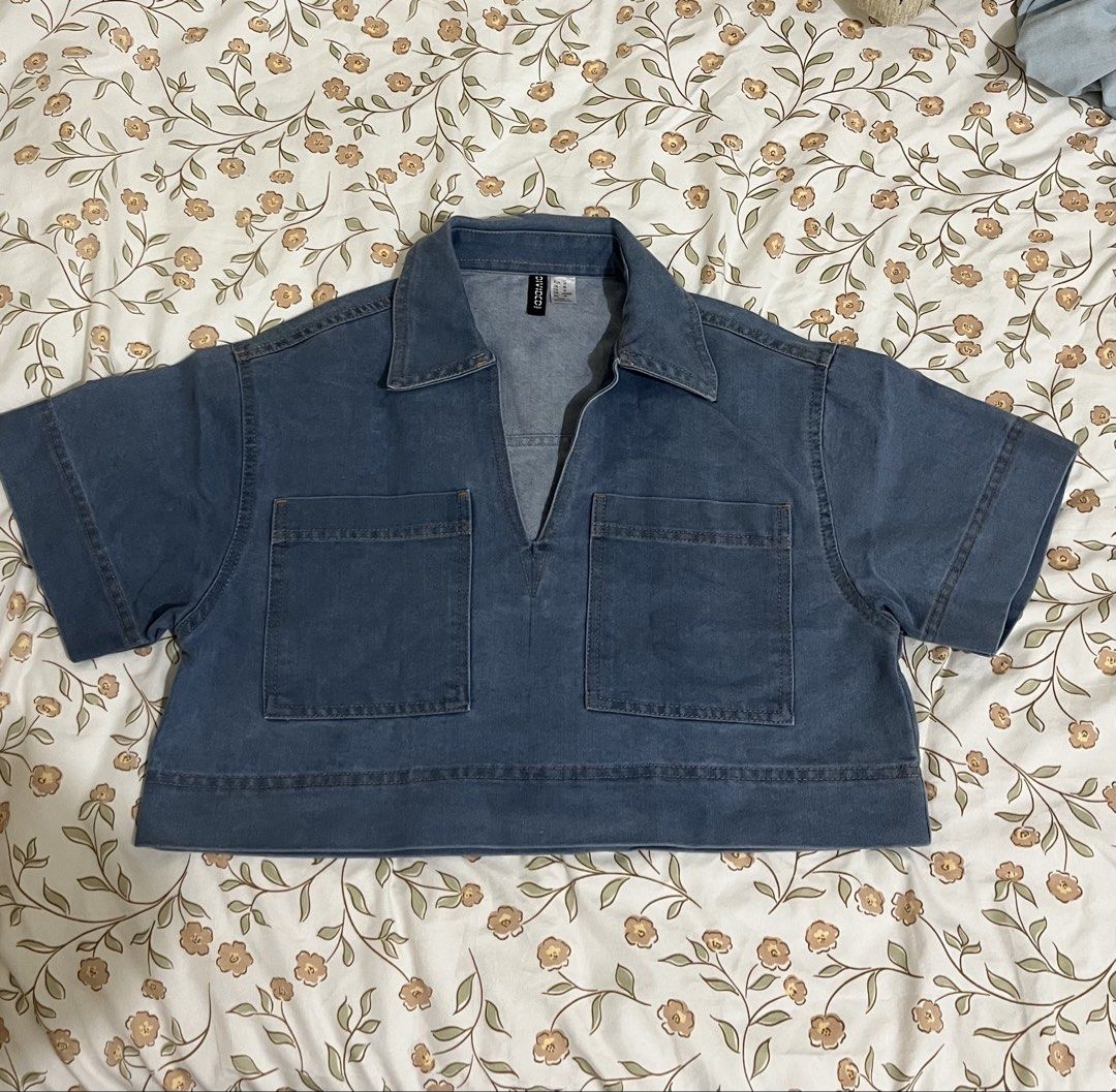 Utility Denim Cropped Polo Top (Medium) (Category: Others Tops) located in San Fernando. Submitted by happy.rexie (Listing ID 1460822520, Image 1). Description: • Size on Tag: Medium (M) • Color: Classic Medium Denim Blue • Style: Cropped Utility Denim Polo / V-Neck Top • Width (Flat-laid): 22 inches • Shoulder: 19 inches • Bust Fit: Best fits 34 – 36 inches • Condition: Pre-loved / Excellent condition! Clean, sturdy denim fabric with no flaws..