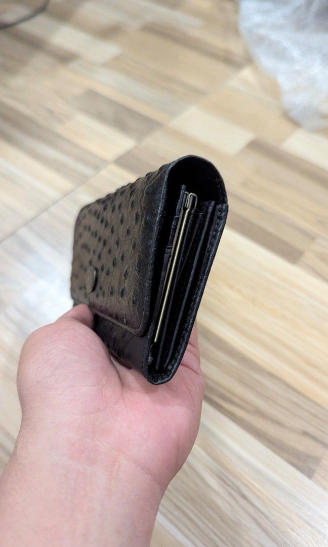 Valentino Black Ostrich Leather Wallet (Category: Luxury Bags & Wallets) located in Pasay City. Submitted by aatapparelshop (Listing ID 1460772975, Image 3). Description: GOOD CONDTION NO ISSUE 2K SHIPPED.