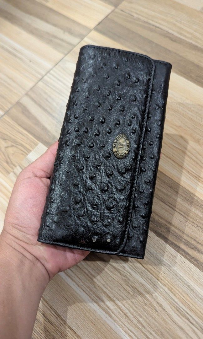 Valentino Black Ostrich Leather Wallet (Category: Luxury Bags & Wallets) located in Pasay City. Submitted by aatapparelshop (Listing ID 1460772975, Image 1). Description: GOOD CONDTION NO ISSUE 2K SHIPPED.