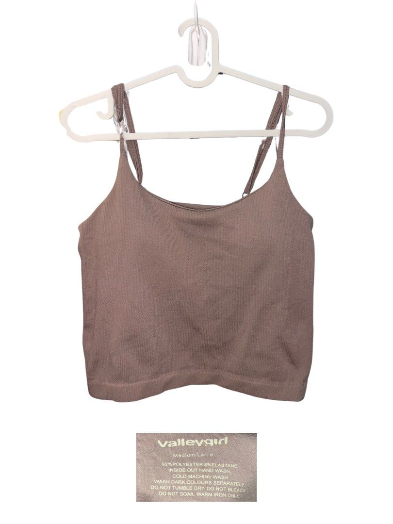 Valleygirl Ribbed Crop Top - Medium/Large (Category: Sleeveless) located in Manila. Submitted by roni.mrnt (Listing ID 1460906975, Image 1). Description: •Style: Brown ribbed crop top •Material: Polyester and elastane for a comfy fit •Versatile: Perfect for layering or wearing on its own - Care Instructions: - Hand wash inside out - Cold machine wash - Wash dark colours separately - Do not tumble dry, bleach, or soak - Warm iron only.