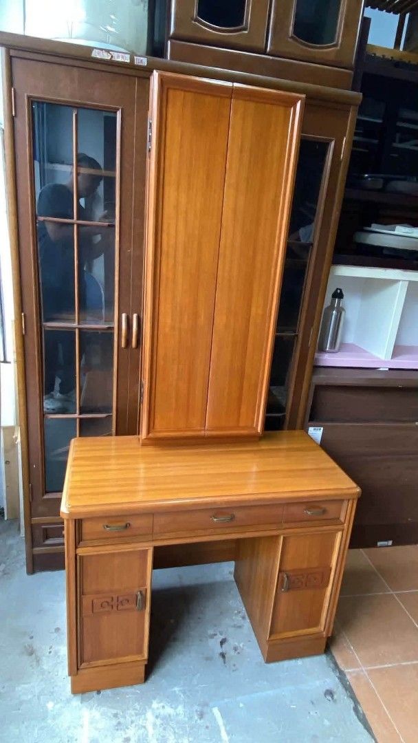 Vanity Table with Trifold Mirror and Chair Set (Category: Tables & Sets) located in Quezon City. Submitted by dannikkishoppe2 (Listing ID 1460808536, Image 2). Description: Vanity Table with Trifold Mirror and Chair Set ‼️₱9800‼️ L33.5 W15.5 H26.5;67 inches Chair with storage: L14 W13 H13 inches Please manage your expectations as there might be minimal flaws. Color may vary due to lighting, it may appear darker or lighter in person. Check photos 