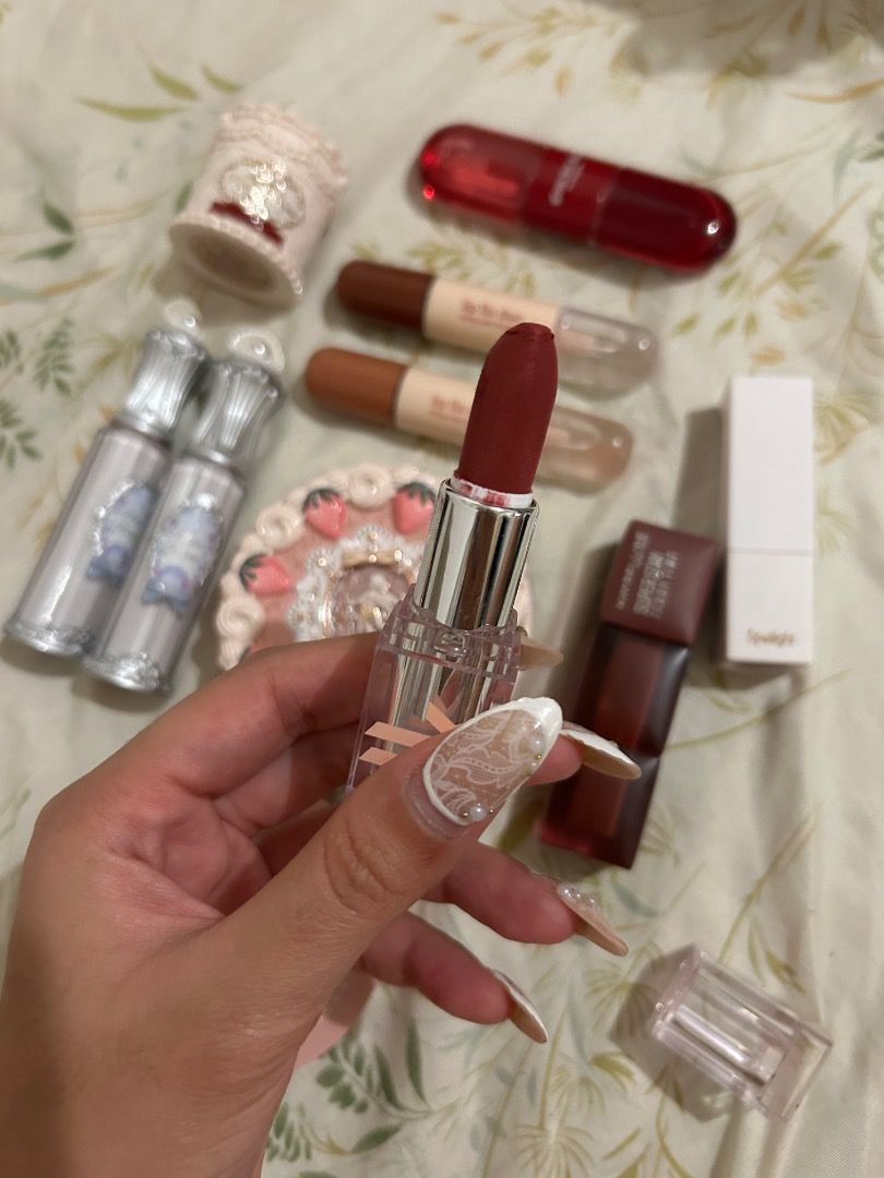 Various Lipsticks, Lip Tints, and Powder (Category: Makeup) located in Santa Rita. Submitted by chloeclosette (Listing ID 1458970954, Image 2). Description: Preloved Makeup bundle for sale Spotlight matte lipstick, shade plum juice Squad lip fix duo, shade muffin and tiramisu Squad glossy tint duo, shade strawberry juice Blk matte lipstick, shade flirt Zeesea spf powder Buyer shoulders sf Loc: pampanga.