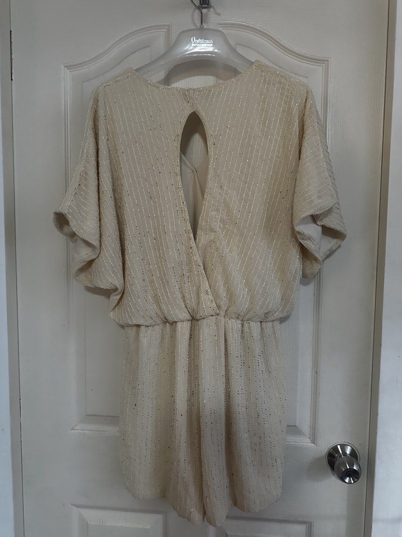 Vertu Beaded Romper with Keyhole Back (Category: Rompers) located in Manila. Submitted by nfcloset_ (Listing ID 1460788682, Image 1). Description: - Cream colored romper - Size L - Features sparkly bead details - Short sleeves - Cinched waist for a flattering fit - Chic keyhole cutout at the back - Ideal for a night out or a special occasion.