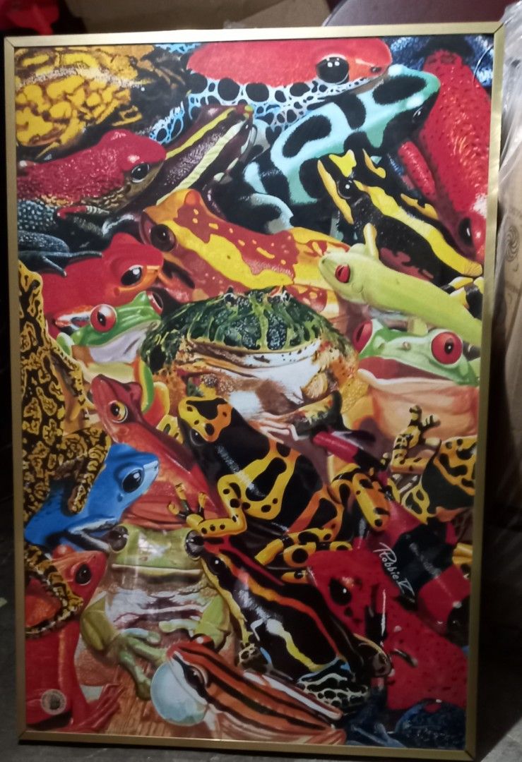 Vibrant Frog Collage Framed Art Print. (Category: Frames & Pictures) located in Las Pinas. Submitted by mickey4224 (Listing ID 1460758831, Image 1). Description: - Vibrant framed art print featuring a colorful collage of diverse frog species. - Elegant gold-toned frame. - Ideal gift for animal enthusiasts and art collectors. - Comes ready to hang. - Damaged on one side of the corner see last picture,36 inches height 25 inches lenght..
