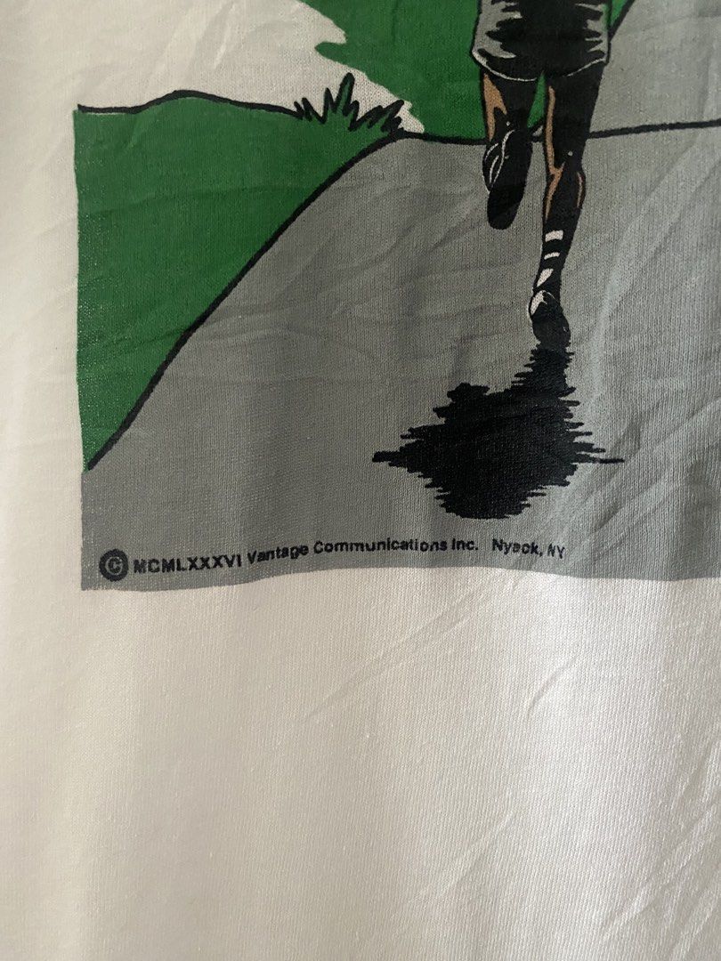 Vintage 1986 Race Green Statement Ringer Tee (Category: Tshirts & Polo Shirts ) located in Quezon City. Submitted by rlphvncntbs (Listing ID 1460754937, Image 3). Description: Vintage 1986 "The Race is not always to the swift but to those who keeps on running" Green Statement Ringer Tee Size: Large Measurements: 21" x 26" Flaws: Pinholes, Light Yellowing Stains Still in Good Condition Screen Stars Tag ₱2,000 + SF (Negotiable).