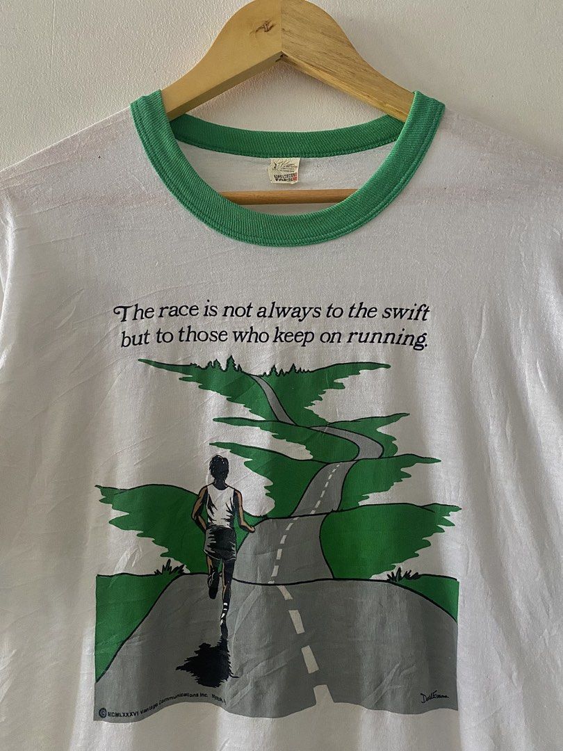 Vintage 1986 Race Green Statement Ringer Tee (Category: Tshirts & Polo Shirts ) located in Quezon City. Submitted by rlphvncntbs (Listing ID 1460754937, Image 2). Description: Vintage 1986 "The Race is not always to the swift but to those who keeps on running" Green Statement Ringer Tee Size: Large Measurements: 21" x 26" Flaws: Pinholes, Light Yellowing Stains Still in Good Condition Screen Stars Tag ₱2,000 + SF (Negotiable).