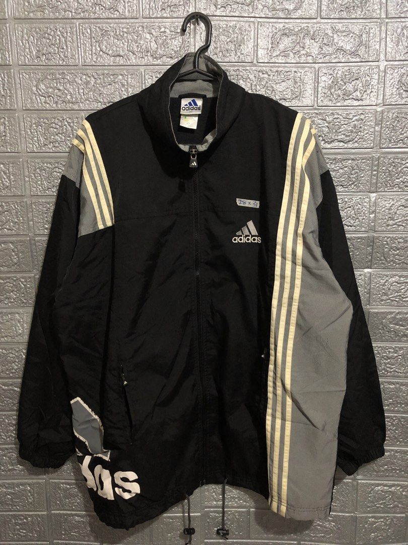 Vintage Adidas y2k Jacket (Category: Coats, Jackets and Outerwear) located in Manila. Submitted by raremountain00 (Listing ID 1460903230, Image 1). Description: Authentic Excellent condition 28 x 31 dimes Issue check last 2 pictures .