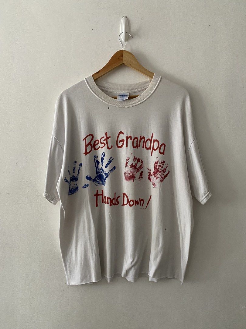 Vintage "Best Grandpa Hands Down!" Statement Tee (Category: Tshirts & Polo Shirts ) located in Quezon City. Submitted by rlphvncntbs (Listing ID 1460753297, Image 1). Description: Vintage "Best Grandpa Hands Down!" Statement Tee Size: XL (Cropped) Measurements: 24" x 26.5" Raw Hem Still in Good Condition M&O Knits Tag ₱500 + SF (Negotiable).