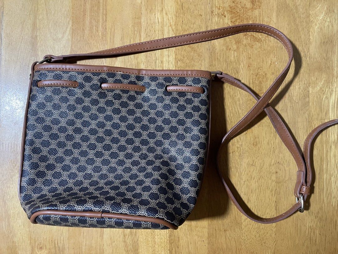 vintage Celine Macadam Bucket Drawstring Shoulder Bag (Category: Shoulder Bags) located in Bacoor. Submitted by safecloud.a52cfe (Listing ID 1460870393, Image 2). Description: vintage Celine Macadam Bucket Drawstring Shoulder Bag Has signs of usage but not abused In good usable condition No wear & tear No tarnish on the lock Straps are intact and no leather damages Price fixed purchased for 5k+ Location: Bacoor Cavite .