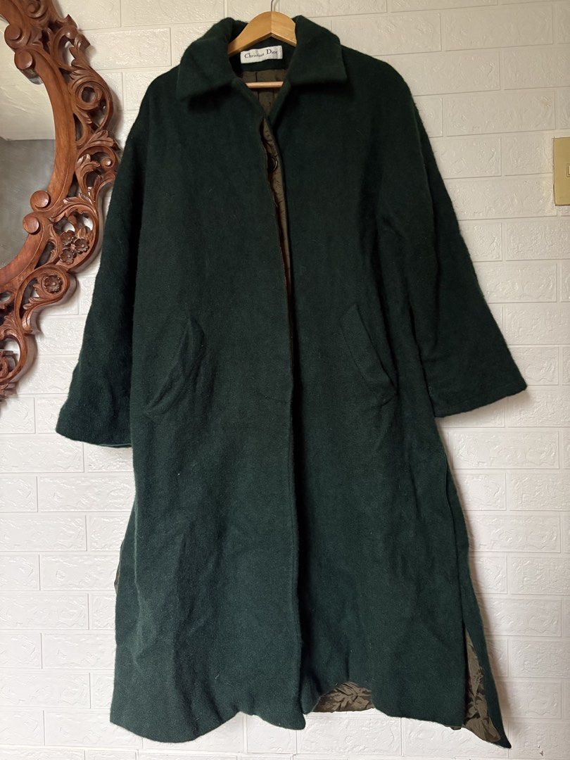 Christian Dior Forest Green Coat (Category: Coats, Jackets and Outerwear) located in Batangas. Submitted by purple_and_orange (Listing ID 1460780362, Image 1). Description: - Classic Christian Dior long coat - Deep green color - Wool blend material - Fully lined with satin-like fabric - Two front pockets - Button closure - Size 12 - A timeless addition to any wardrobe.