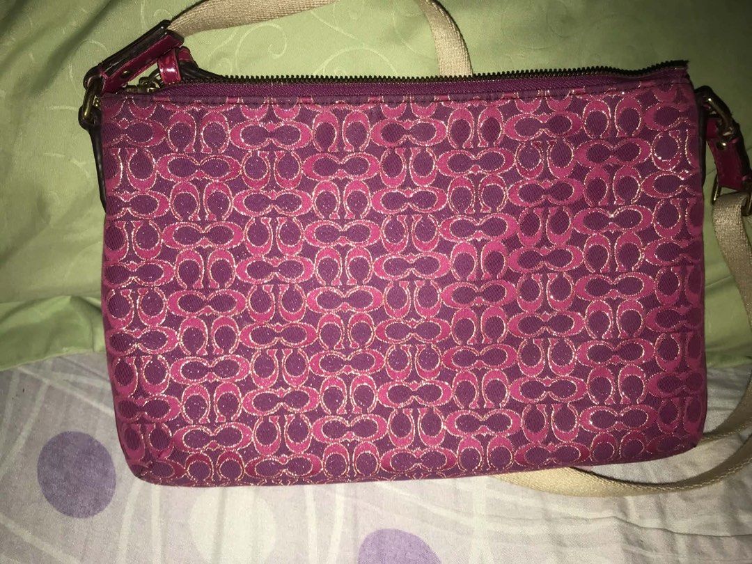 Vintage Coach Poppy (Category: Cross-body Bags) located in Antipolo. Submitted by noellemags (Listing ID 1460899261, Image 2). Description: •Poppy Signature Metallic East West Swingpack (50288) Raspberry • Has discoloration (can be restored) •Price is negotiable .