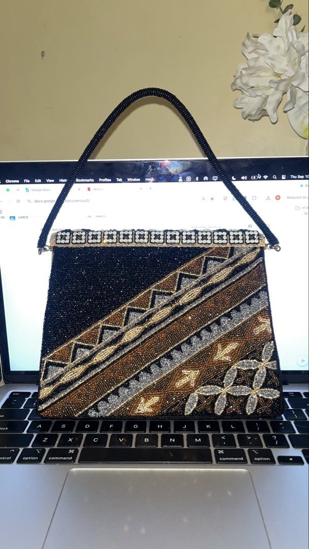 Vintage fully beaded small ibiza bag (Category: Purses & Pouches) located in Tanauan. Submitted by londonscuratedcloset (Listing ID 1460792438, Image 1). Description: - Vintage fully beaded small bag - Ibiza style - Intricate beadwork with geometric and floral patterns - Colors: Black, gold, silver - Small size, perfect for essentials - Ships via Lalamove/J&T.