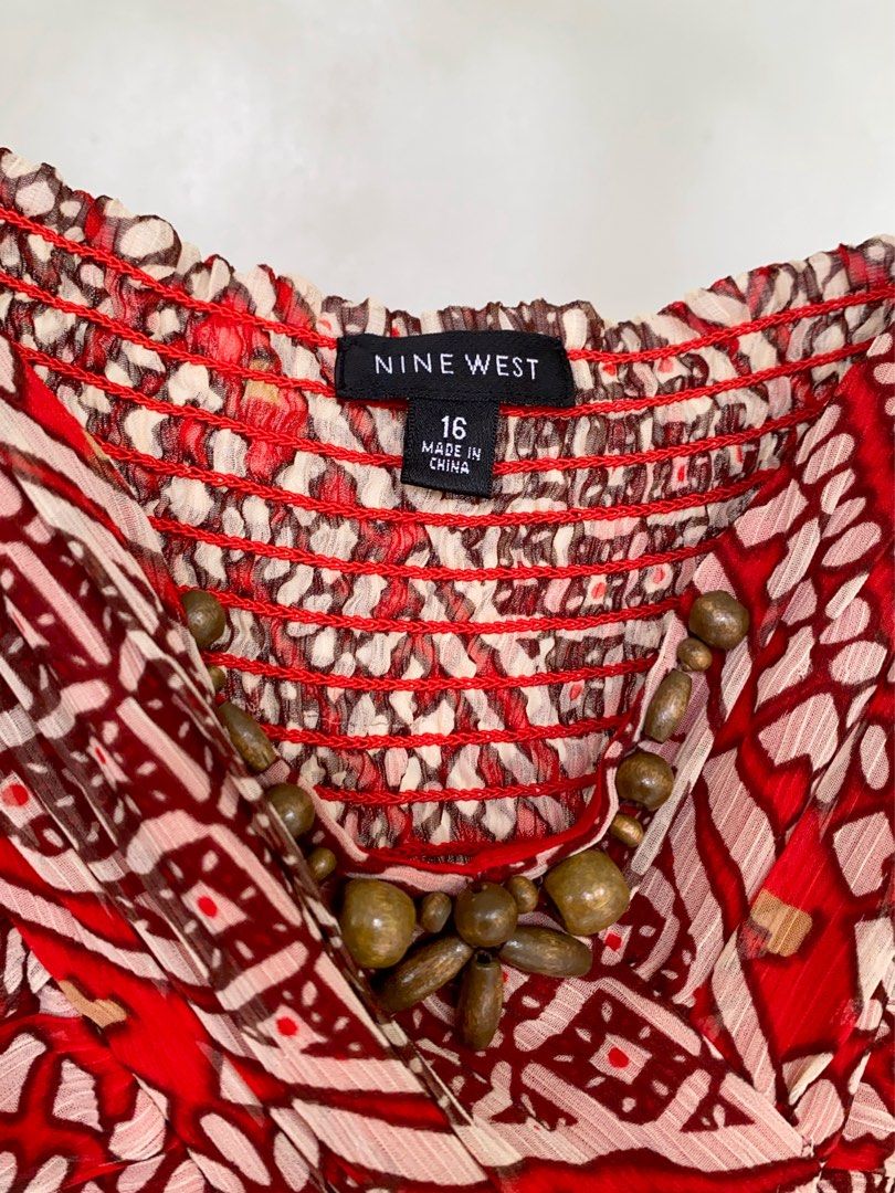 VINTAGE NINEWEST BOHO Y2K TOP (Category: Blouses) located in Naga. Submitted by willowjuls (Listing ID 1460745642, Image 2). Description: Super eye-catching vintage-style cami with an intricate red, cream & brown geometric print. ♡ Adjustable-looking spaghetti straps ♡ Ruched bust ♡ Draped neckline ♡ Beaded detail at neckline ♡ Lightweight fabric ♡ Flowy fit 🍥 size M-L 🍥 minor issues: some loose threads .