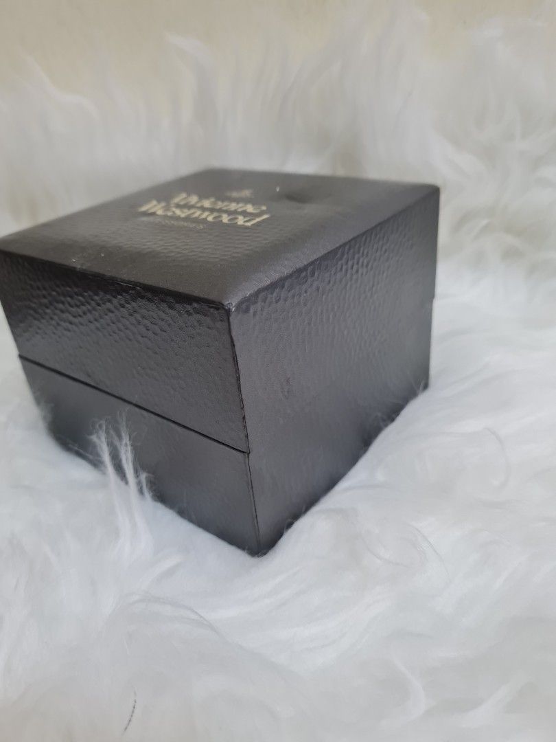 Vivienne westwood (Category: Luxury Accessories) located in Bulacan. Submitted by kraeyon_shop (Listing ID 1460717461, Image 3). Description: ✔️💯 Guaranteed authentic Dimension: 4.2x4.2 in. Vivienne Westwood Accessories luxury presentation box, primarily used for packaging the brand's iconic watches, jewelry, or smaller leather goods..