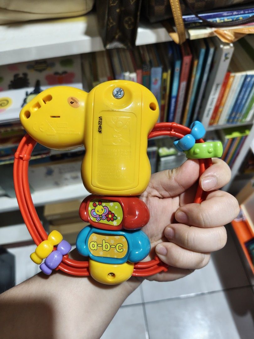 VTech Apple Rattle Baby Toy (Category: Infant Playtime) located in Cavite. Submitted by avbcortes (Listing ID 1460730798, Image 3). Description: - Fun VTech Apple Rattle for babies - Features colorful rings and a cute caterpillar - Lights up and plays music - Great for sensory development and teething - Easy for little hands to grasp and shake - Batteries included.