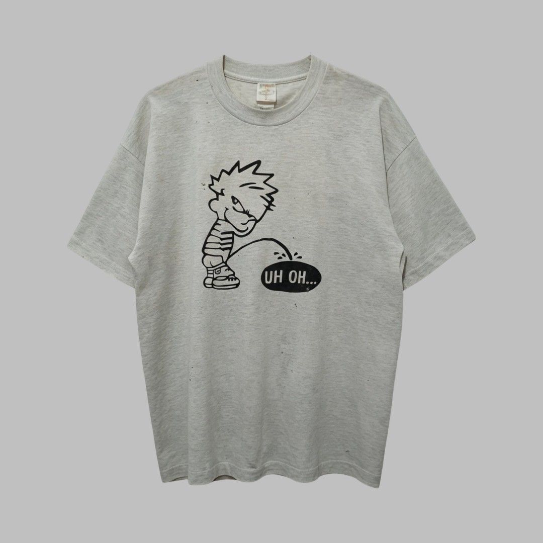 Vtg peeing calvin (Category: Tshirts & Polo Shirts ) located in Dagupan City. Submitted by old_soul_finds.ph (Listing ID 1460911200, Image 1). Description: Dimensions : L31 x W25 Color Rate : 8 / 10 Issues : See other pics Good condition Mine for only ₱500 📍Loc : Pangasinan MOP : Gcash MOD : J&T express / Ava pasabay if around Pangasinan.