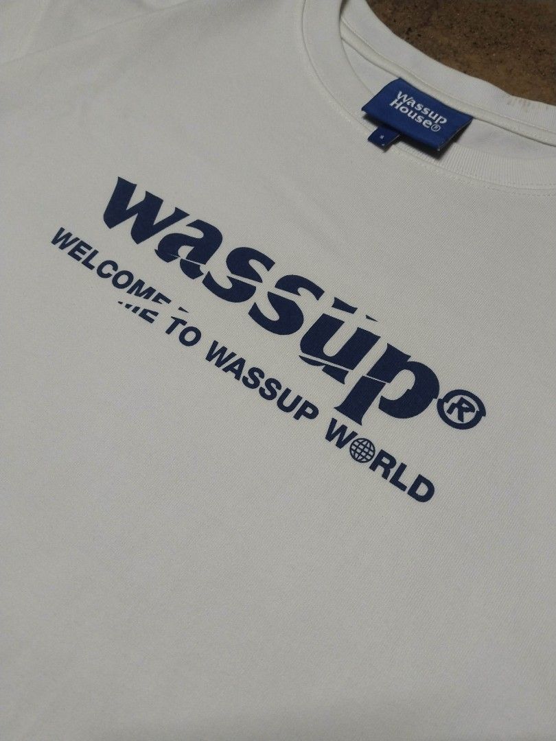 WASSUP TEE (WHITE) (Category: Activewear) located in Manila. Submitted by thriftbang (Listing ID 1460804331, Image 3). Description: WASSUP TEE (WHITE) - EXCELLENT CONDITION - COMPLETE TAGS - NEED REWASH (SMALL STAIN) - THICK FABRIC DIMES: S ON TAG WIDTH 22.5 LENGTH 28 PAYMENT FIRST SHIP THRU JNT 250+SF LOC. BRNGY UGONG VALENZUELA CITY.