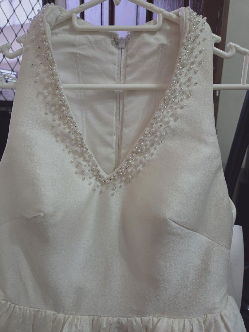 Wedding coords (Category: Sets or Coordinates) located in Cainta. Submitted by happy_shopping07 (Listing ID 1460813781, Image 2). Description: - Elegant white two-piece set perfect for wedding or formal occasions. - Sleeveless V-neck top featuring a beaded neckline and flattering peplum hem. - Convenient back zipper closure on the top. - Includes matching wide-leg pants for a complete, chic look. - Designed for a comfortable fit while maintaining