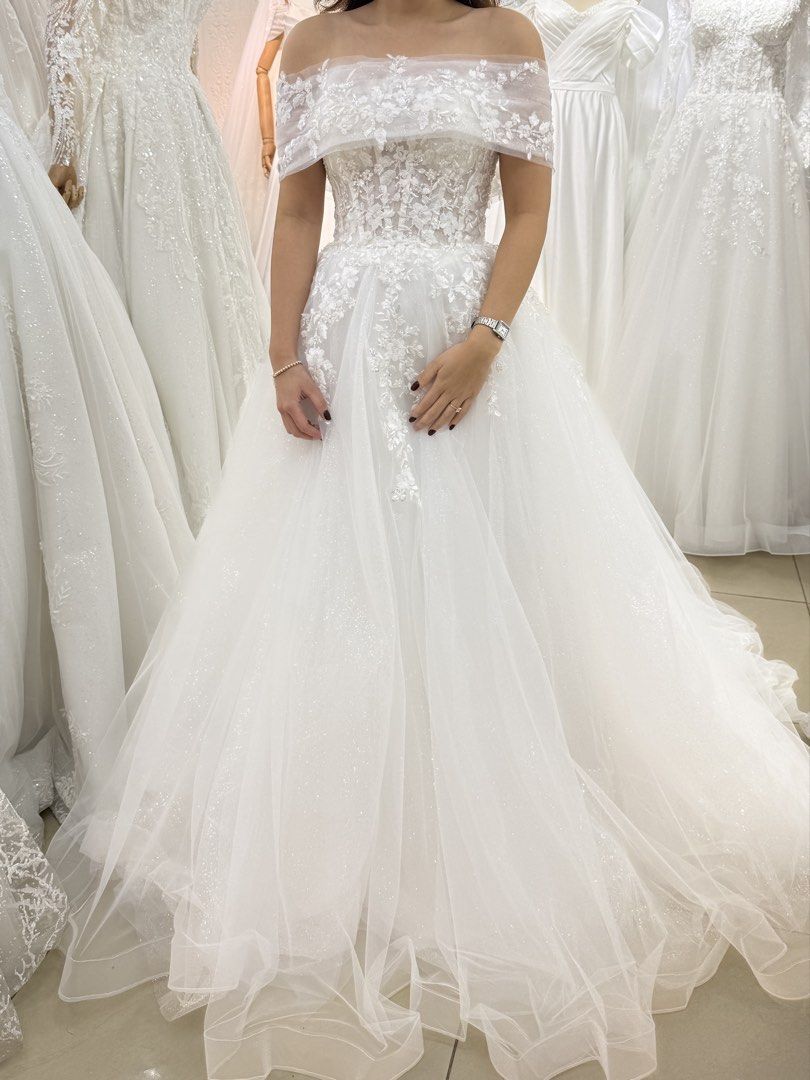 Wedding Gown (Category: Dresses) located in Pilar. Submitted by _alecsmendiola (Listing ID 1460901057, Image 1). Description: Corset-type; Lacework; Tube/Wrap Dress; Custom With Veil Size: 28in waist; Height: 5’3 (wore 2-inch heels) Used on May 24, 2026 Location: Bataan Bought fron MK Gali Fashion Boutique (168 Mall) Price is negotiable :).