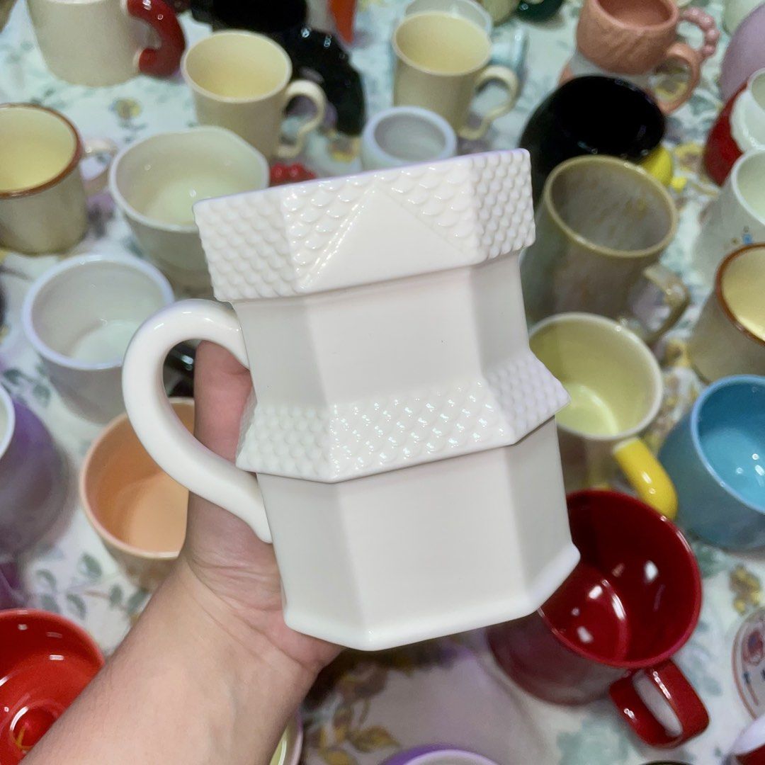 White Geometric Textured Mug with Handle (Category: Coffee & Tea Tableware) located in Valenzuela. Submitted by baekhyunie_pau (Listing ID 1460811719, Image 1). Description: White geometric textured mug with handle. Stylish and functional. Dishwasher safe (handwash recommended)..