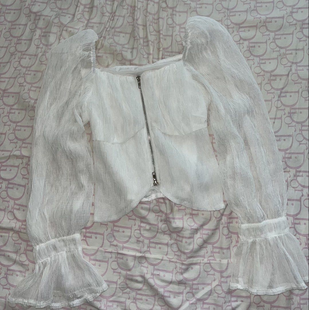 White Long sleeve Zipper Crop Top (Category: Blouses) located in Manila. Submitted by cosmicwhale.54b057 (Listing ID 1460746519, Image 2). Description: never been worn loc: pampanga mod: jnt.