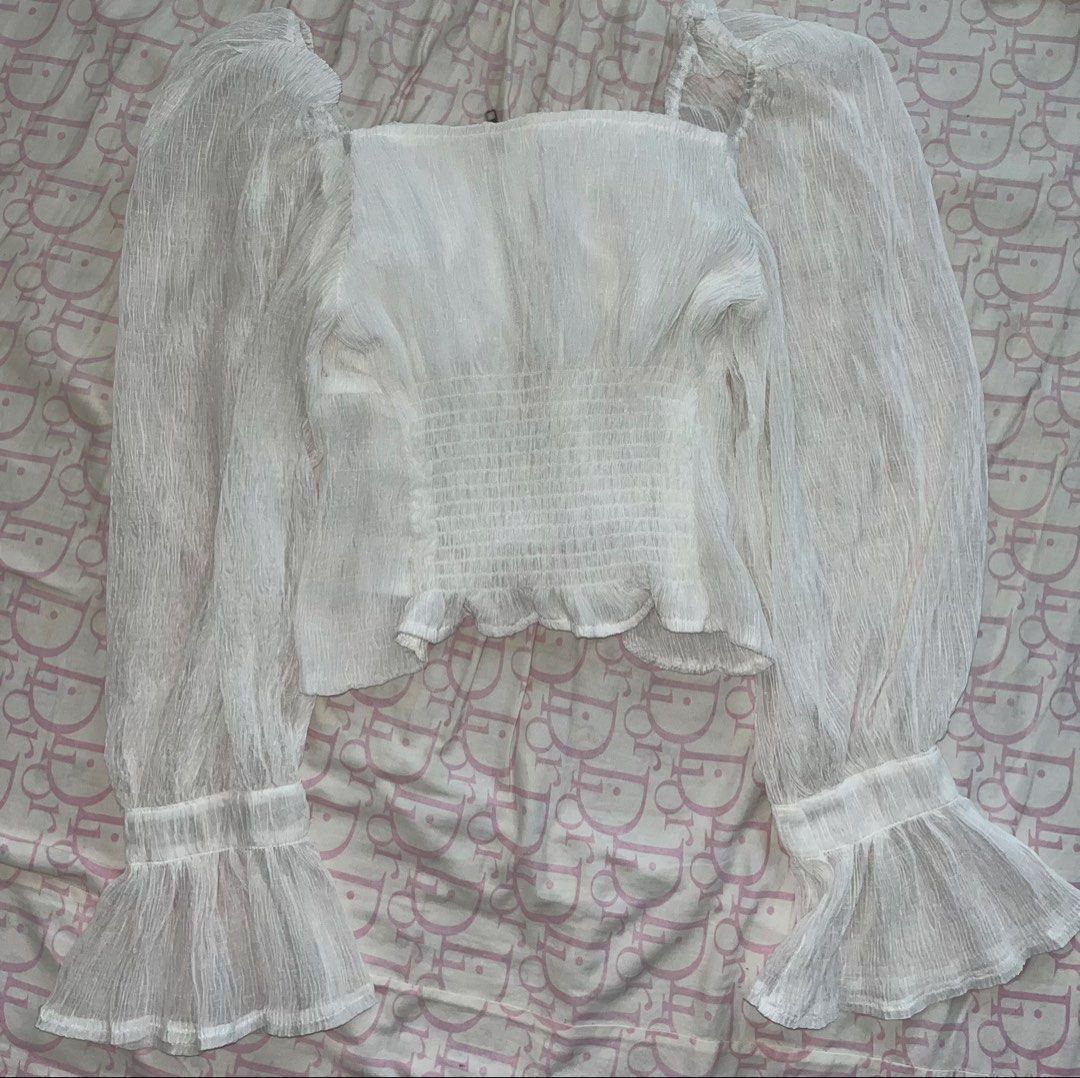 White Long sleeve Zipper Crop Top (Category: Blouses) located in Manila. Submitted by cosmicwhale.54b057 (Listing ID 1460746519, Image 3). Description: never been worn loc: pampanga mod: jnt.