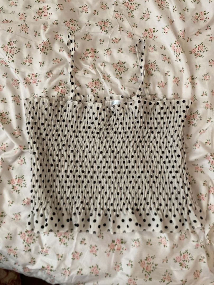 white polka smocked tank top (Category: Sleeveless) located in Caloocan City. Submitted by v6nnies (Listing ID 1460812966, Image 1). Description: white polka smocked tank top size s-m bought from a pop up for 350 then i got it altered to small .