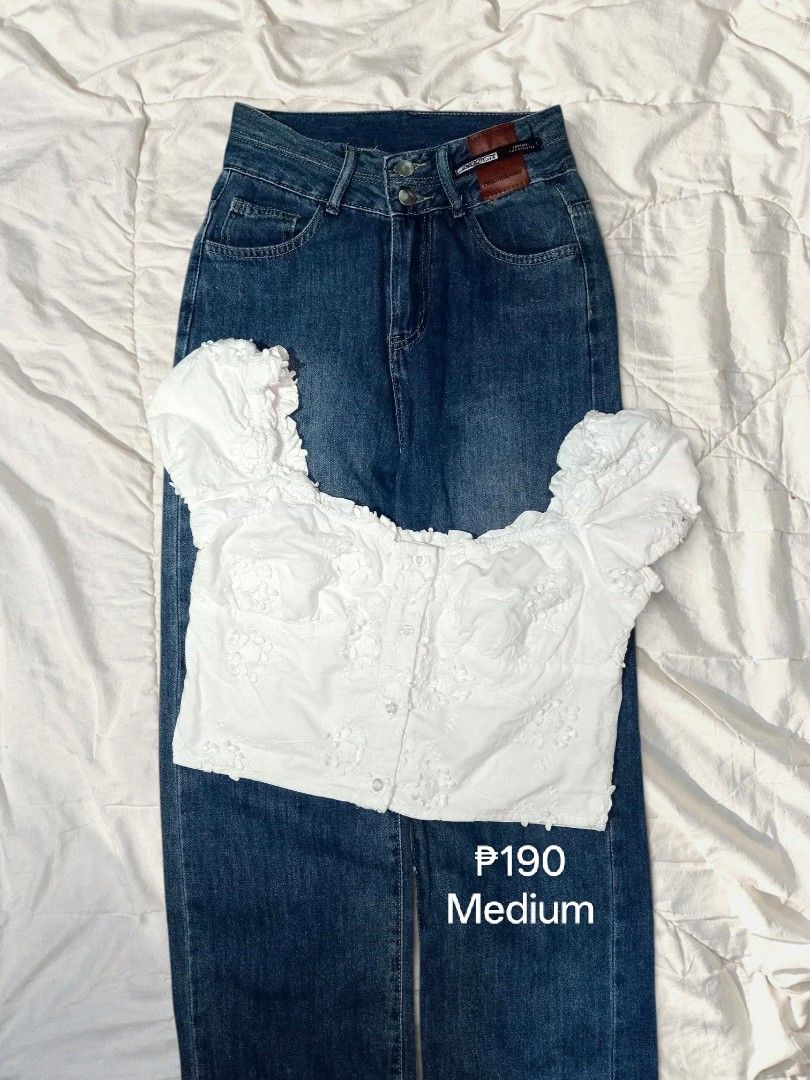 White Puff Sleeve Top & Blue Denim Jeans Set (Category: Blouses) located in Muntinlupa City. Submitted by kryztelle.tidal (Listing ID 1460716459, Image 1). Description: - Cute white puff sleeve top - Floral details on top - Button-up front - High-waisted blue denim jeans - Perfect for casual day out or night with friends - Comfortable and stylish - Complete set for an effortless look.