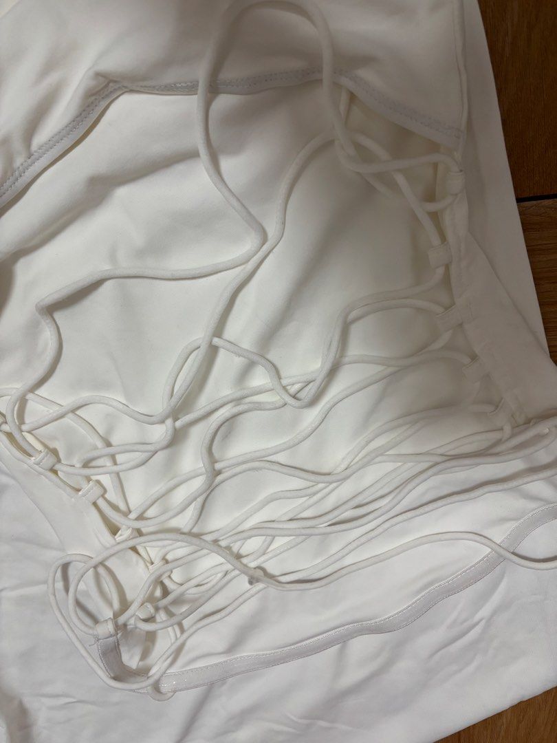 White Strapless Maxi Dress with Lace-Up Back (Category: Dresses) located in Rizal. Submitted by jmcraftingphhandicrafts (Listing ID 1460852695, Image 2). Description: - White strapless maxi dress - Bodycon fit for a flattering silhouette - Features a stylish lace-up back detail - Ideal for events, parties, or a night out - Simple yet chic design - BrandNew.