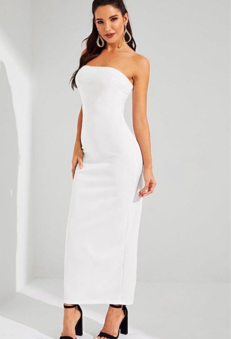 White Strapless Maxi Dress with Lace-Up Back (Category: Dresses) located in Rizal. Submitted by jmcraftingphhandicrafts (Listing ID 1460852695, Image 1). Description: - White strapless maxi dress - Bodycon fit for a flattering silhouette - Features a stylish lace-up back detail - Ideal for events, parties, or a night out - Simple yet chic design - BrandNew.