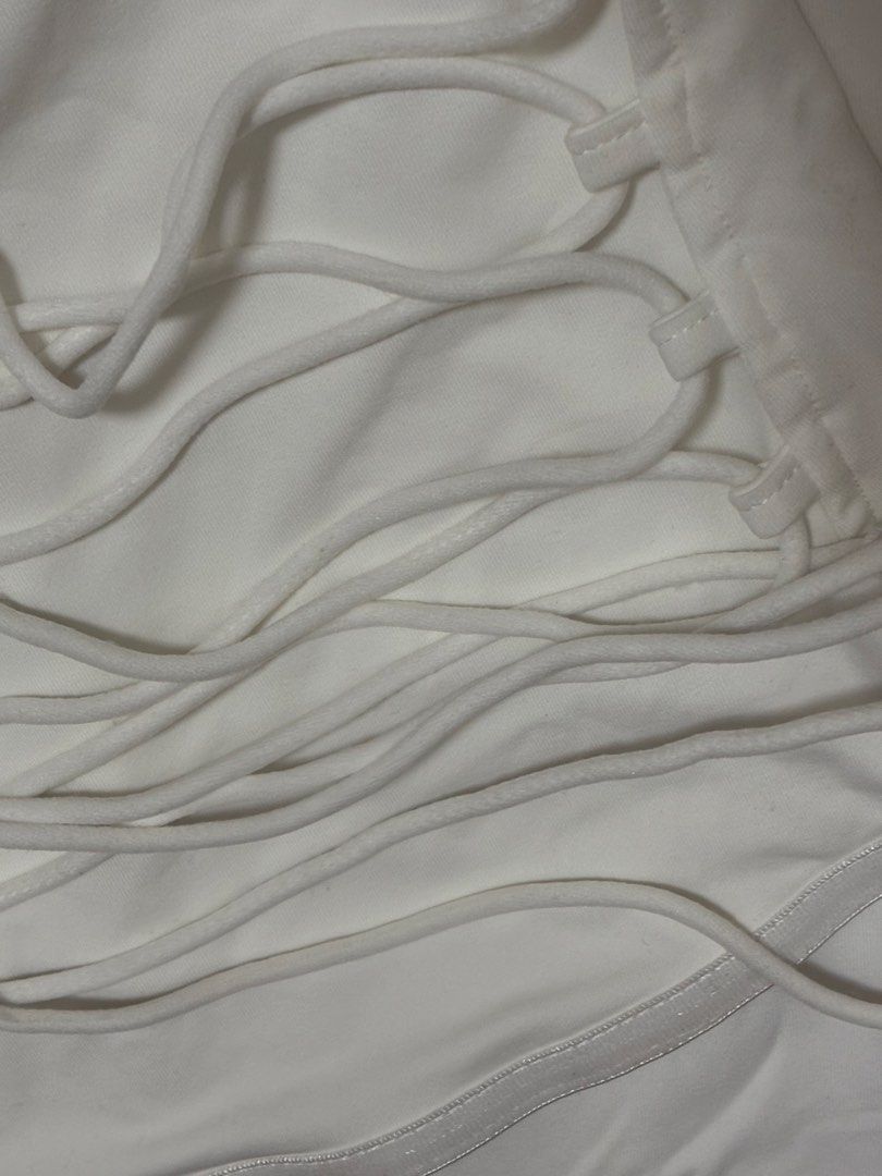 White Strapless Maxi Dress with Lace-Up Back (Category: Dresses) located in Rizal. Submitted by jmcraftingphhandicrafts (Listing ID 1460852695, Image 3). Description: - White strapless maxi dress - Bodycon fit for a flattering silhouette - Features a stylish lace-up back detail - Ideal for events, parties, or a night out - Simple yet chic design - BrandNew.