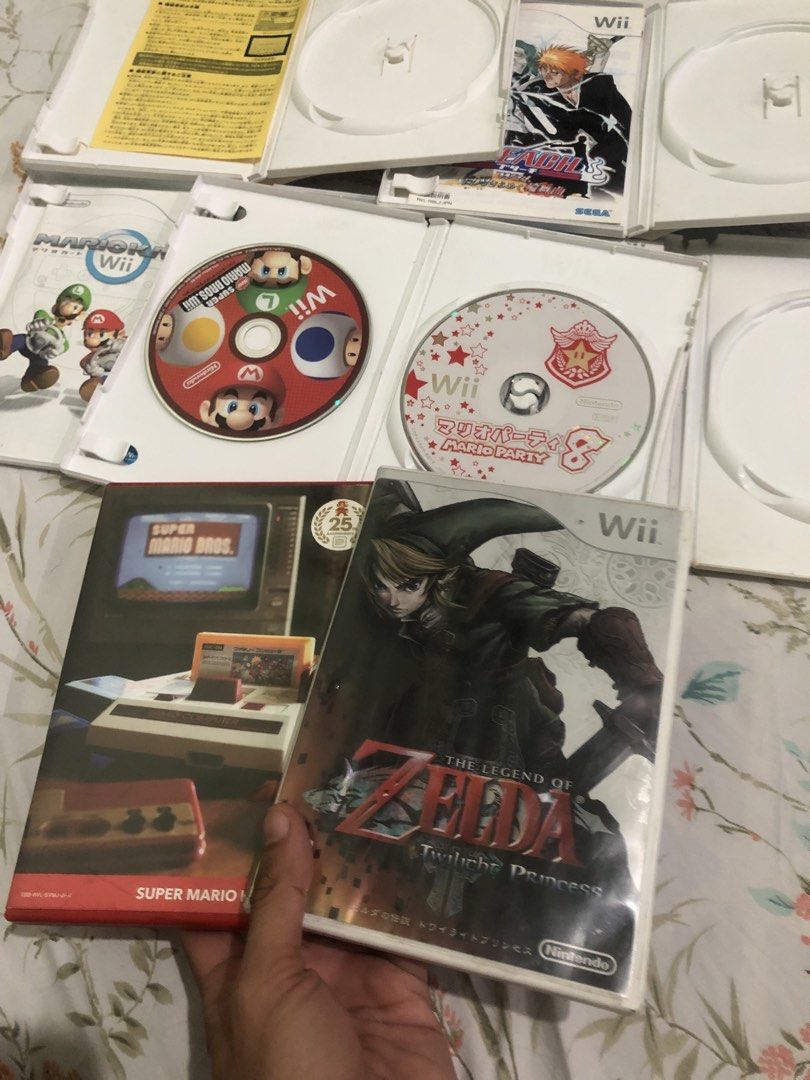 Wii Game discs bundle no set breaking (Category: Nintendo) located in Quezon City. Submitted by markgolveo (Listing ID 1460746767, Image 1). Description: Wii Game discs bundle no set breaking Read below please All items are jpn regions Untested discs no unit to test Selling as is stated Set includes The legend of Zelda twilight princess Complete with manuals disc Super mario 25th anniversary soundtrack disc complete with manuals sleeves and cover