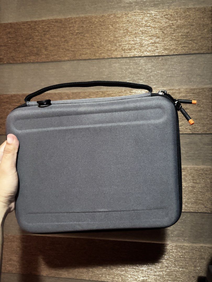 WIWU Grey Hard Shell Storage Case (Category: Storage Boxes & Baskets) located in Cebu City. Submitted by lloydhabas89820 (Listing ID 1460775852, Image 2). Description: - WIWU grey hard shell case - Ideal for storing electronics or accessories - Includes a convenient handle - Comes with a detachable shoulder strap - Secure zip closure - Clean and well-maintained interior - Ready for its new owner.