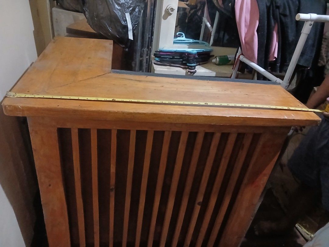 Wooden Counter with Slatted Sides (Category: Tables & Sets) located in Manila. Submitted by pretty0099 (Listing ID 1460830280, Image 2). Description: - Sturdy wooden counter with a smooth, finished top. - Features attractive slatted sides. - Dimensions: Approximately 39 inches long, 20 inches deep, and 36 inches high. - Ideal for use as a bar counter or display unit..