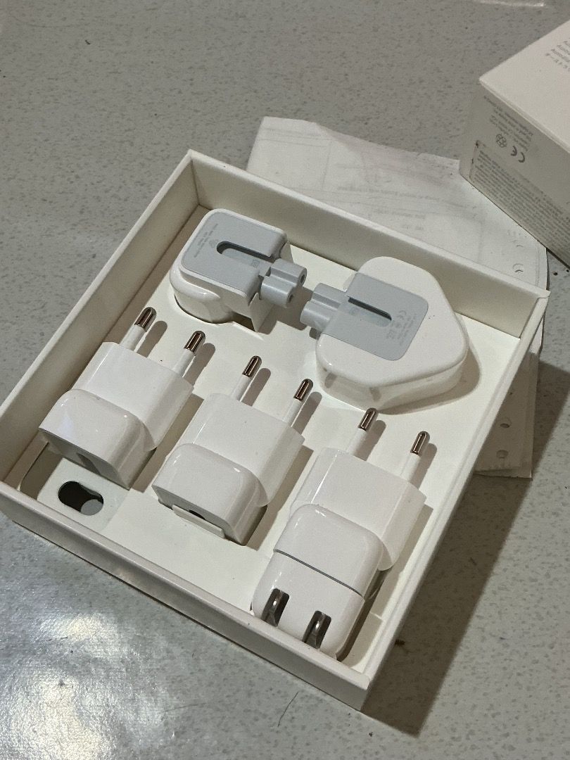 World Travel Adapter Kit/ AC Plugs (Category: Cables & Adaptors) located in Caloocan City. Submitted by kharyl_02 (Listing ID 1460740943, Image 3). Description: Apple AC Plugs / Duckheads (from World Travel Adapter Kit) Condition: Brand new, never used - bought July 2025, only used 1 plug *3x EU Plug for Spain/Europe, 1x UK Plug, 1x Australia/China + US plug *Compatible with MacBook, iPad, iPhone power adapter. Original Apple. Can do individual o