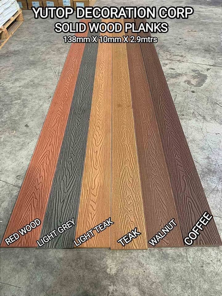 WPC Solid Wood Planks - Various Colors (Category: Construction & Building Materials) located in Manila. Submitted by yutopdecor.23 (Listing ID 1460716400, Image 1). Description: - Solid wood planks by Yutop Decoration Corp. - Available Colors: Red Wood, Light Grey, Light Teak, Teak, Walnut, Coffee - Dimensions: 138mm (width) x 10mm (thickness) x 2.9mtrs (length) - Ideal for gate and wall cladding - Durable and stylish finish for your renovation -