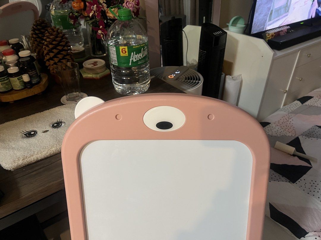 Writing Board/ Whiteboard (Category: Stationery & School Supplies) located in Cainta. Submitted by hunchester (Listing ID 1460889495, Image 2). Description: Whiteboard frame designed in the shape of a cute bear head. It features a sliding adjustable stand to match a child’s height and a matching pink plastic storage shelf at the bottom. The frame can also be completely folded flat for easy and compact storage. Issue: -Other ear design is missing 