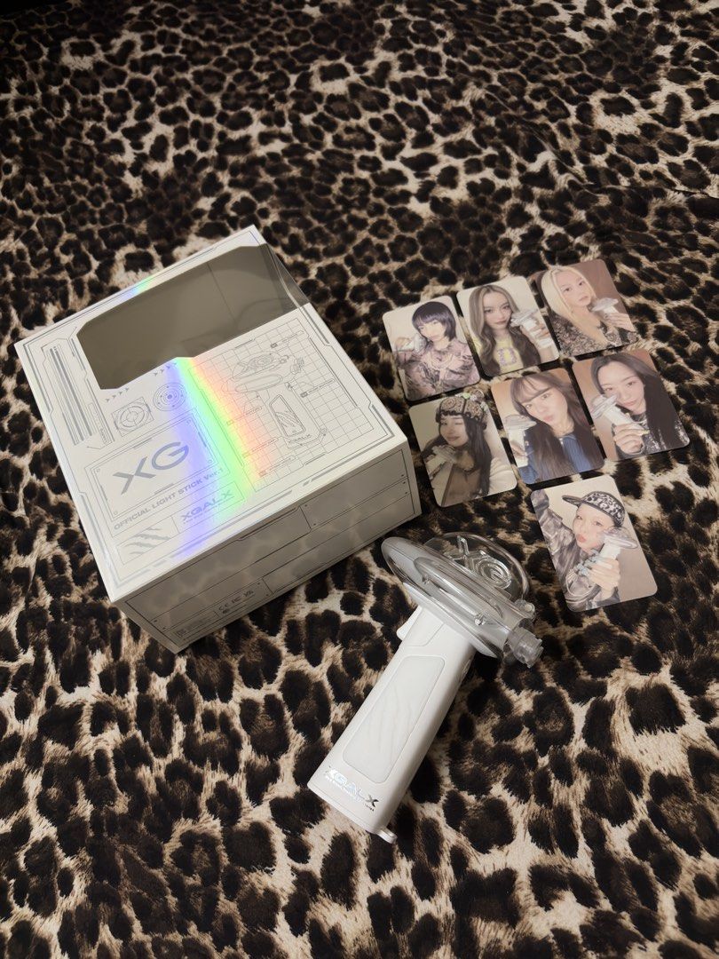 XG LIGHTSTICK VER.1 (Category: Music Accessories) located in Manila. Submitted by virtualhobgoblin2117 (Listing ID 1460877618, Image 2). Description: LFB: XG LIGHT STICK VER-1 bought on sm (day of the concert) only used once (during the core in manila) complete set w photocards good as new RFS: Need funds.