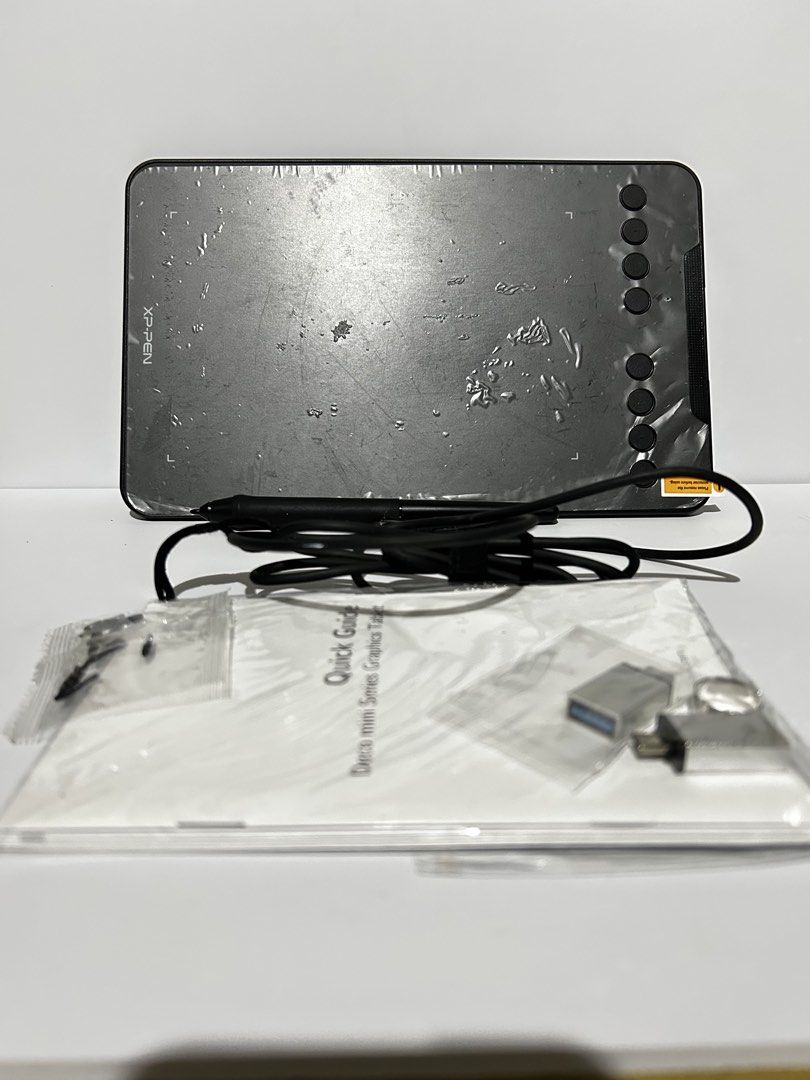 XP-Pen Deco mini 7 Graphics Drawing Tablet (Category: Other Gadgets) located in Caloocan City. Submitted by aliyahnico45041 (Listing ID 1460899940, Image 2). Description: - XP-Pen Deco mini graphics tablet - Includes stylus - Includes USB cable - Comes with a USB adapter - Includes quick start guide - Ideal for digital art and design - Great for sketching and drawing.