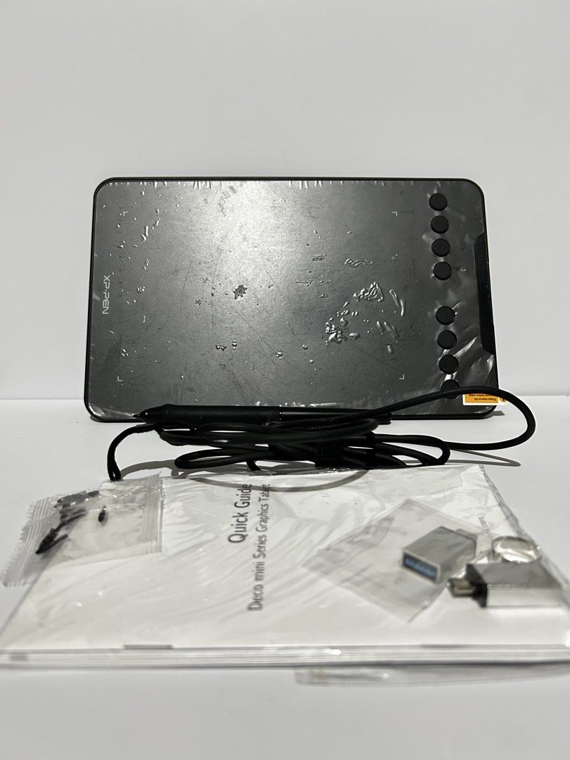 XP-Pen Deco mini 7 Graphics Drawing Tablet (Category: Other Gadgets) located in Caloocan City. Submitted by aliyahnico45041 (Listing ID 1460899940, Image 1). Description: - XP-Pen Deco mini graphics tablet - Includes stylus - Includes USB cable - Comes with a USB adapter - Includes quick start guide - Ideal for digital art and design - Great for sketching and drawing.