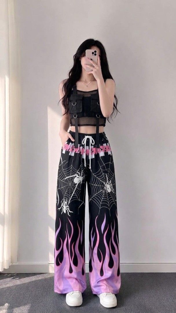 Y2K Flame & Spider Web Cargo Pants (Category: Jeans) located in Manila. Submitted by jenivaclai81140 (Listing ID 1460773703, Image 2). Description: - Super cool Y2K style cargo pants - Black with edgy flame and spider web print - Wide leg fit with adjustable drawstring waist - Multiple pockets and straps for an enhanced look - Available in blue or pink flame designs - Ideal for parties or casual wear.